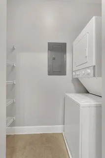 a utility room with washer and dryer