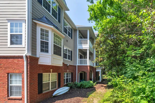 a view of a building with a tree