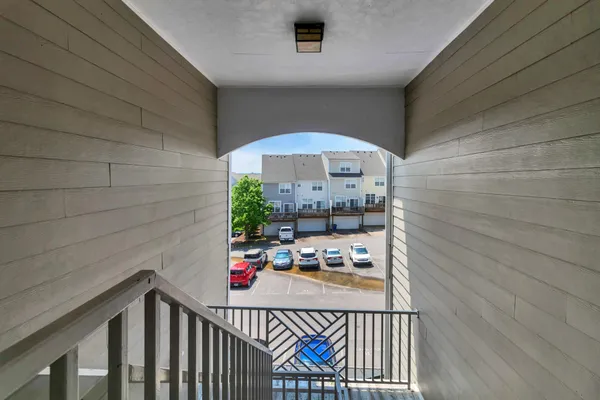 a view of a balcony with an outdoor space