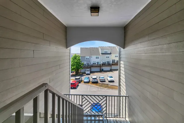a view of a balcony with an outdoor space