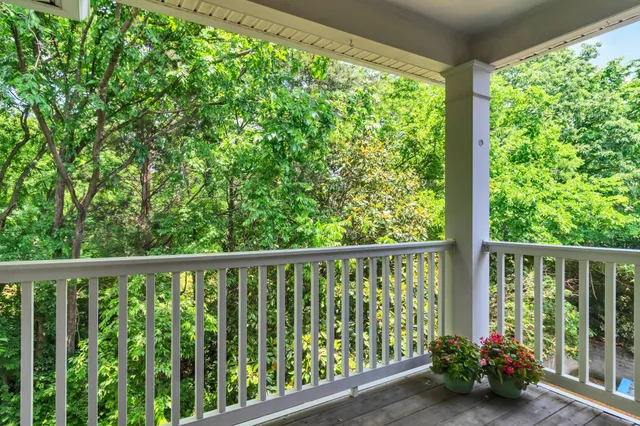 a view of a balcony with lake view