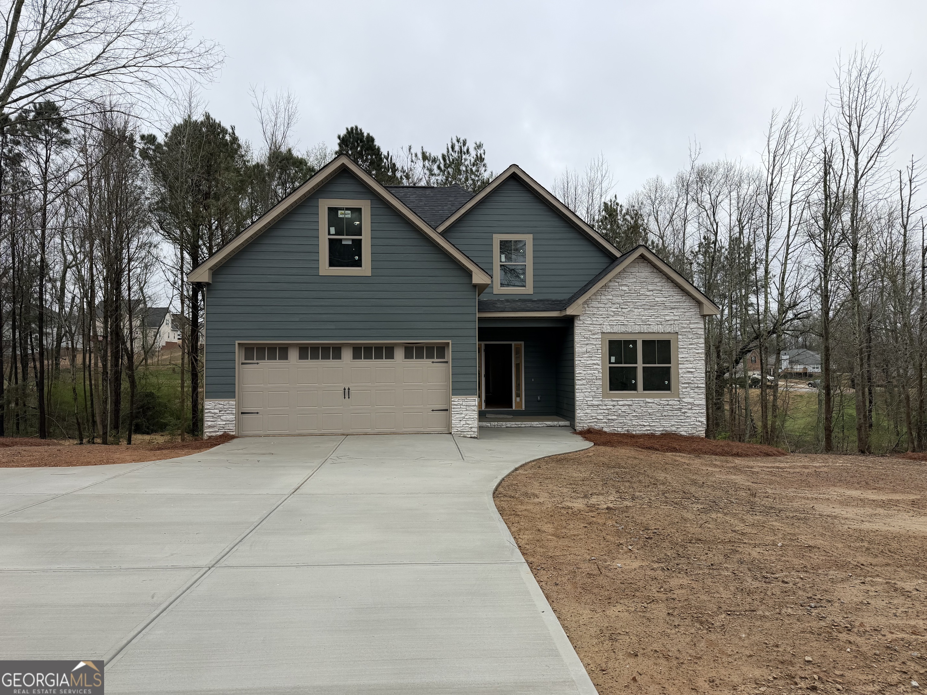 971 Horsley Mill Road Carrollton, GA 30116 - Photo 1 of 8 a front view of a house with yard