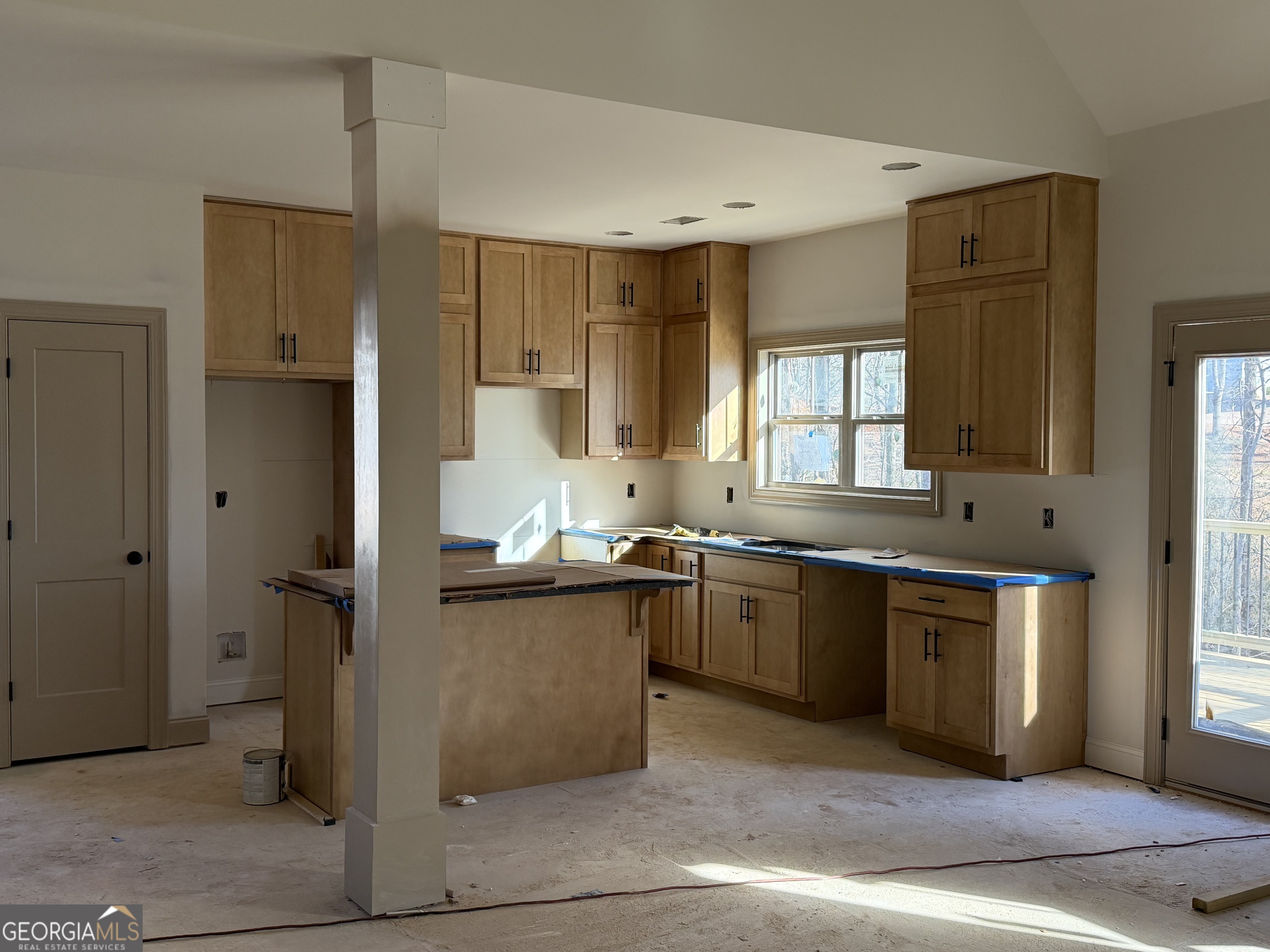 971 Horsley Mill Road Carrollton, GA 30116 - Photo 5 of 8 a large kitchen with stainless steel appliances granite countertop a refrigerator and a sink