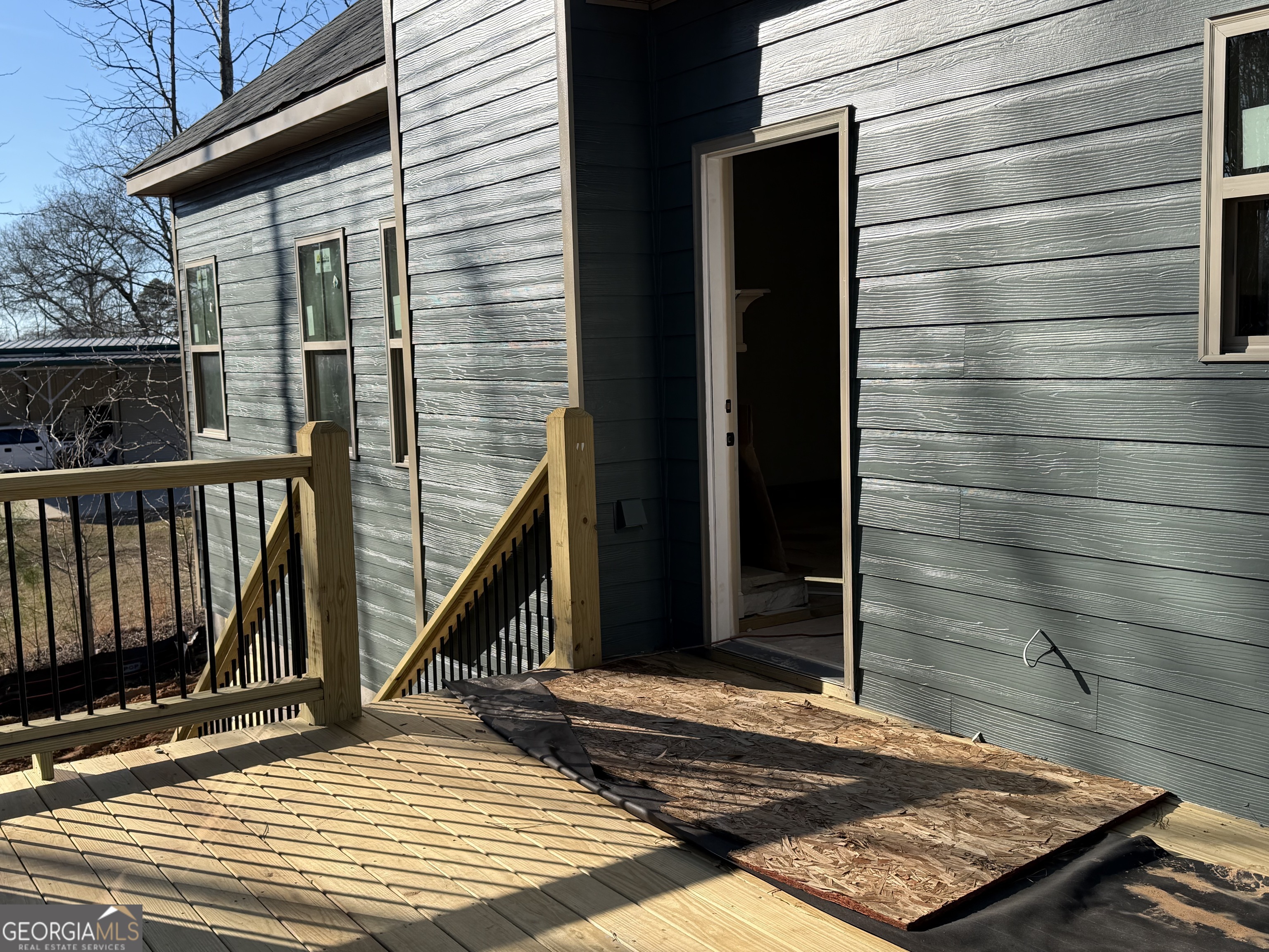971 Horsley Mill Road Carrollton, GA 30116 - Photo 7 of 8 a view of a balcony with a door