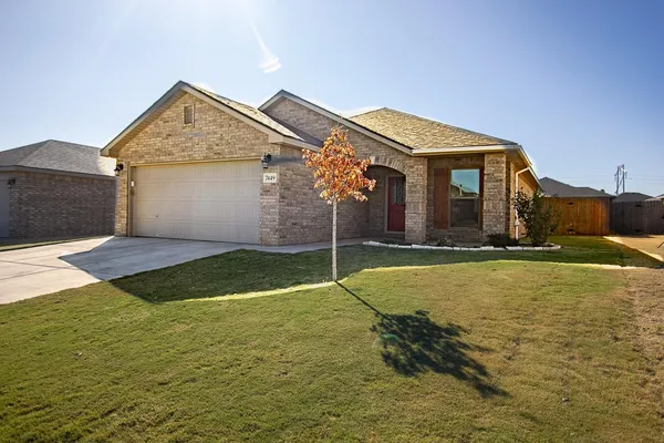 a house with trees in front of it