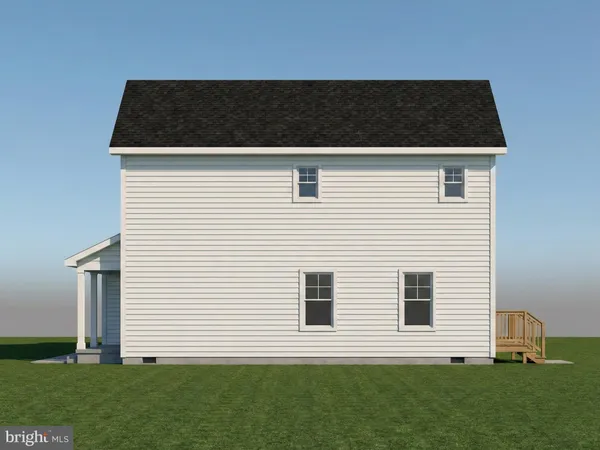 a side view of a house with a yard