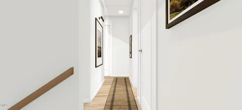 a living room with furniture a chandelier and a dining table