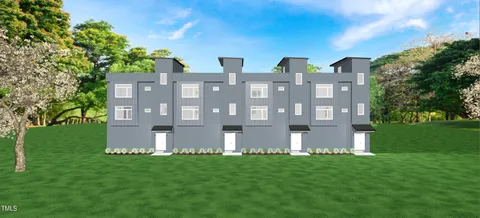 a view of a building with a yard