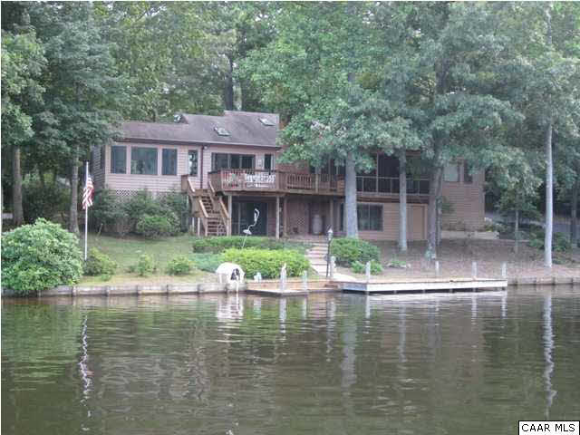 2 Laguna Road Palmyra, VA 22963 - Photo 1 of 31 a house with river in front of it