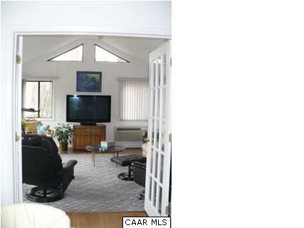 2 Laguna Road Palmyra, VA 22963 - Photo 14 of 31 a living room with furniture and a flat screen tv