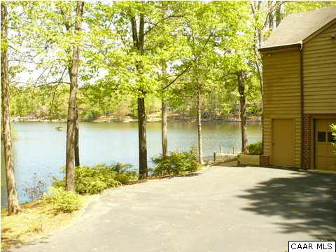 2 Laguna Road Palmyra, VA 22963 - Photo 21 of 31 a view of a house with a yard and lake view
