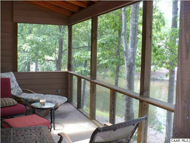 2 Laguna Road Palmyra, VA 22963 - Photo 31 of 31 a view of a porch with furniture and a backyard