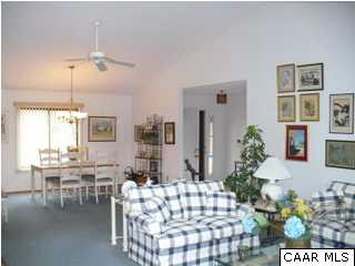 2 Laguna Road Palmyra, VA 22963 - Photo 8 of 31 a living room with furniture and a chandelier