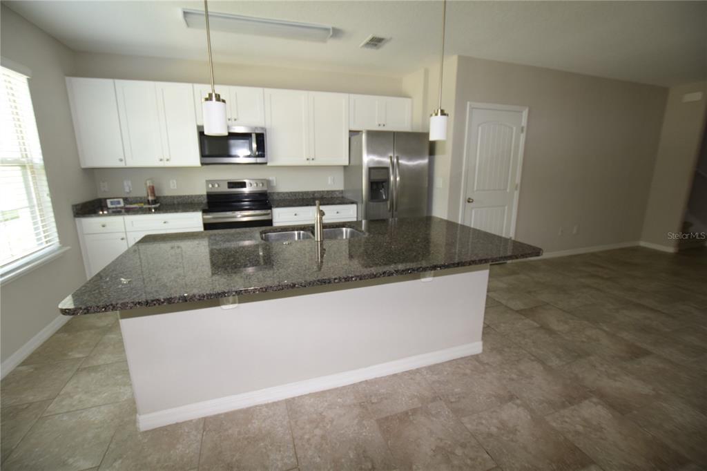 16097 Pebble Bluff Loop Winter Garden, FL 34787 - Photo 8 of 32