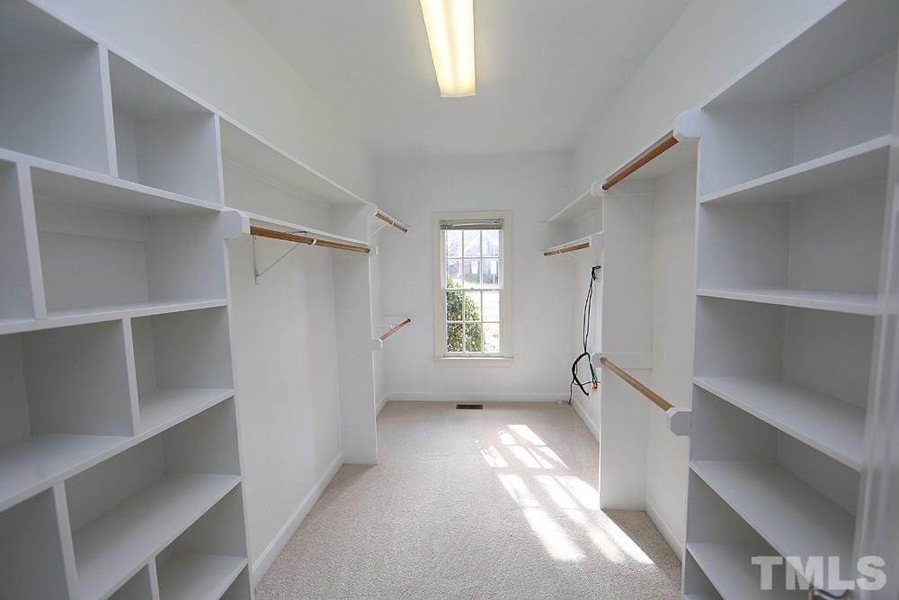 4428 Touchstone Forest Road Raleigh, NC 27612 - Photo 13 of 21 Huge walk in closet with shelving