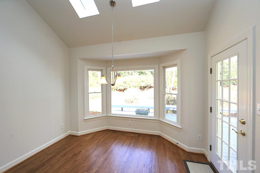 4428 Touchstone Forest Road Raleigh, NC 27612 - Photo 6 of 21 Breakfast nook with hardwood floors