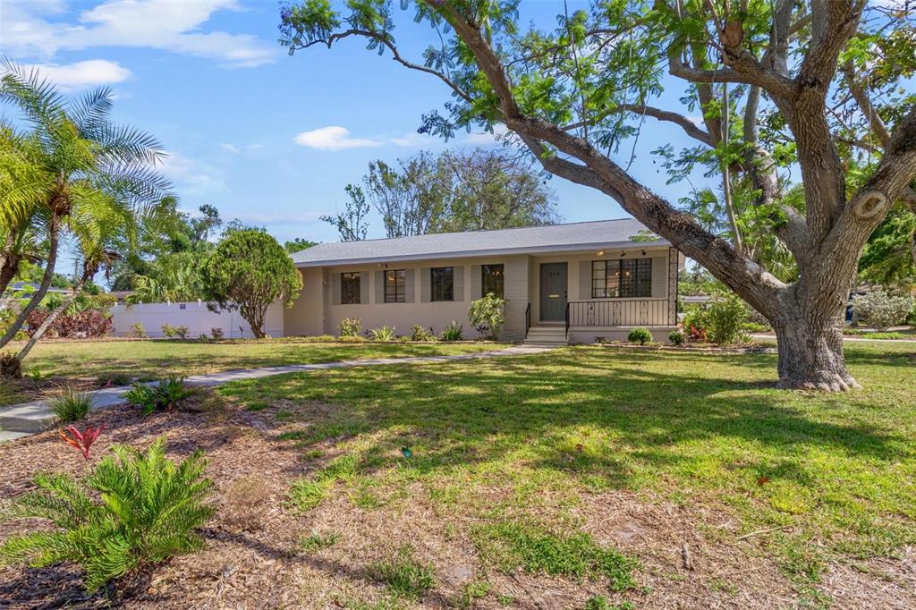 300 22nd Avenue South St. Petersburg, FL 33705 - Photo 1 of 82 a view of a house with a yard