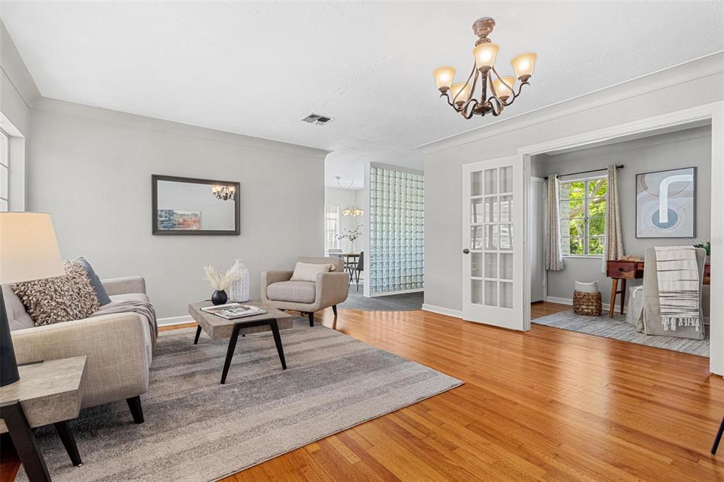 300 22nd Avenue South St. Petersburg, FL 33705 - Photo 37 of 82 a living room with furniture and a wooden floor
