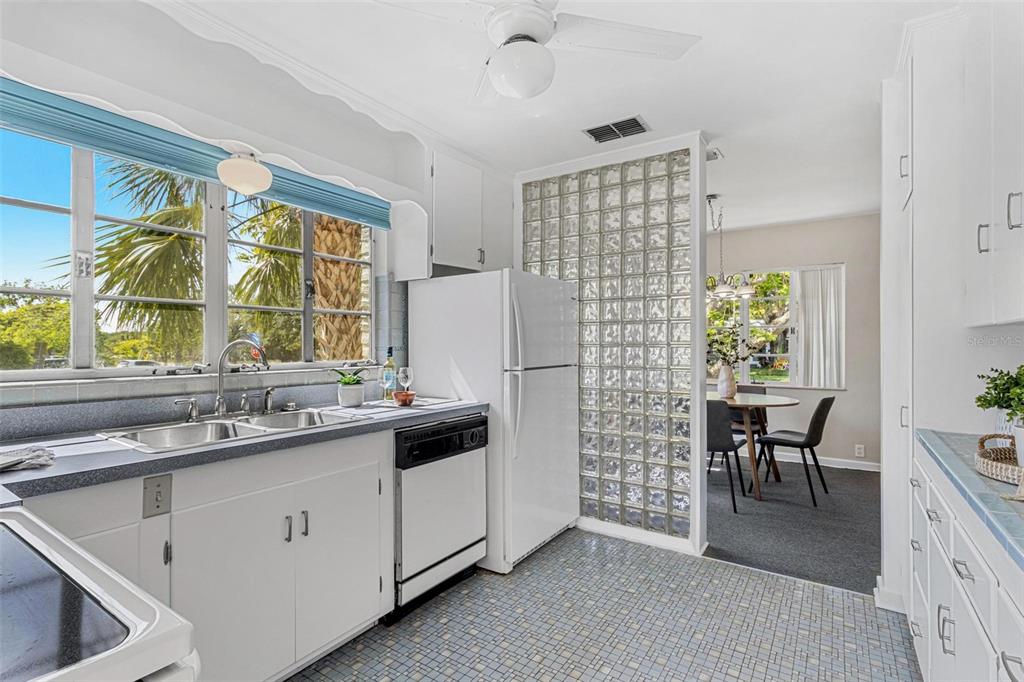 300 22nd Avenue South St. Petersburg, FL 33705 - Photo 42 of 82 a kitchen with a sink and a window