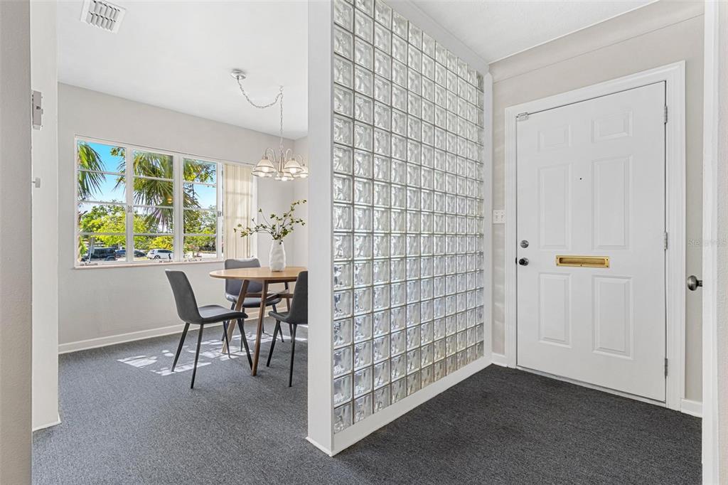 300 22nd Avenue South St. Petersburg, FL 33705 - Photo 46 of 82 a view of a livingroom with furniture and a window