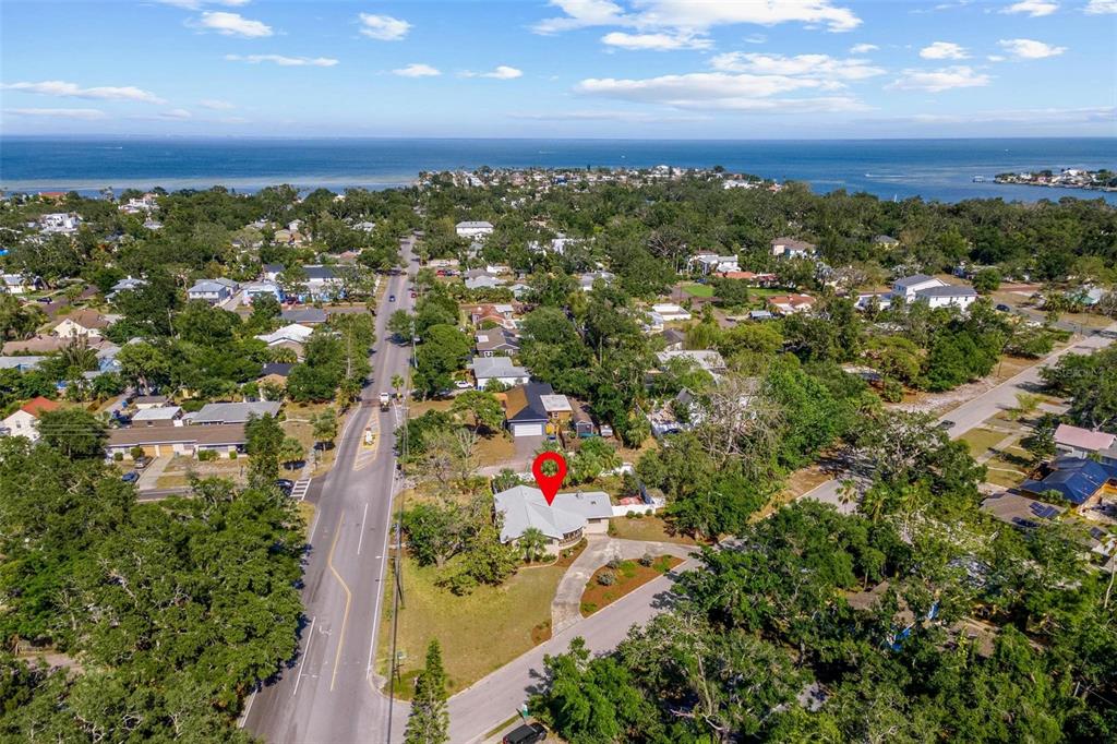 300 22nd Avenue South St. Petersburg, FL 33705 - Photo 65 of 82 an aerial view of residential houses with outdoor space and trees