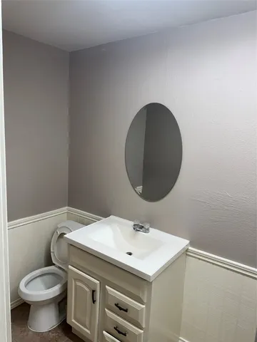 a bathroom with a sink and a toilet