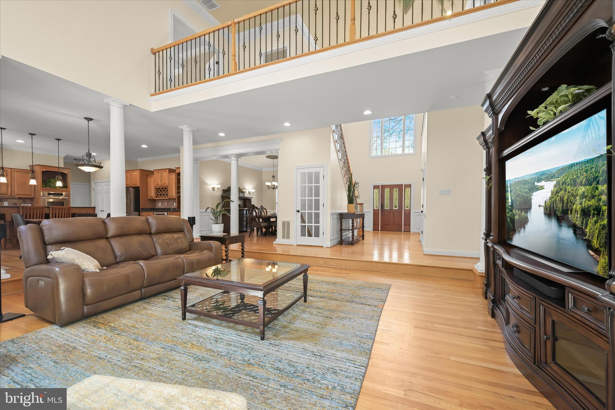 7016 Meandering Stream Way Fulton, MD 20759 - Photo 11 of 86 a living room with furniture and a flat screen tv