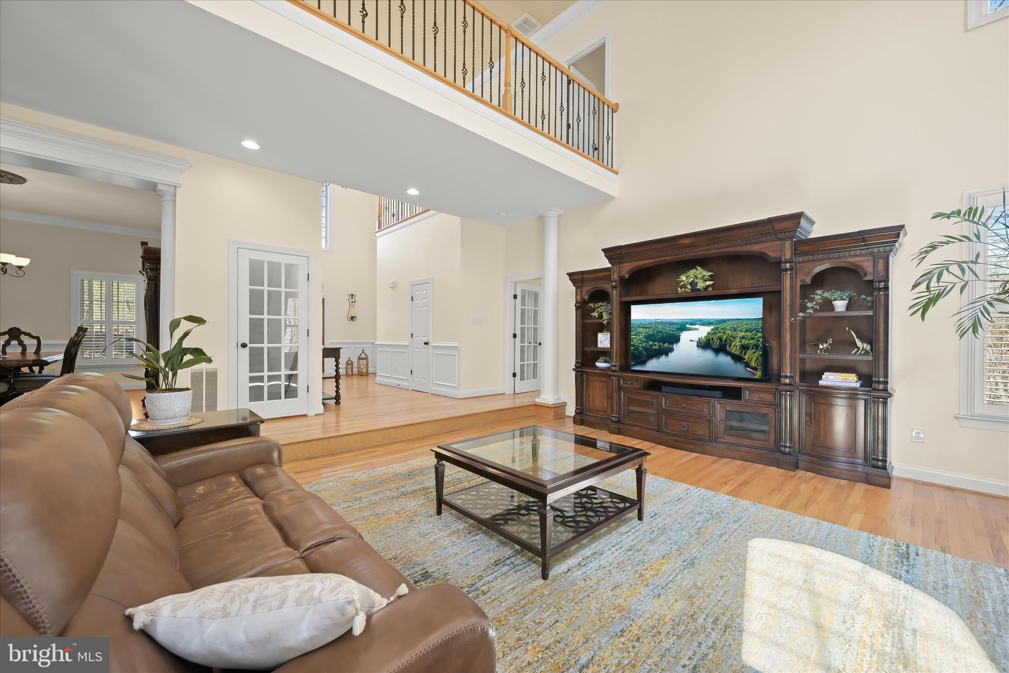 7016 Meandering Stream Way Fulton, MD 20759 - Photo 12 of 86 a living room with furniture and a flat screen tv