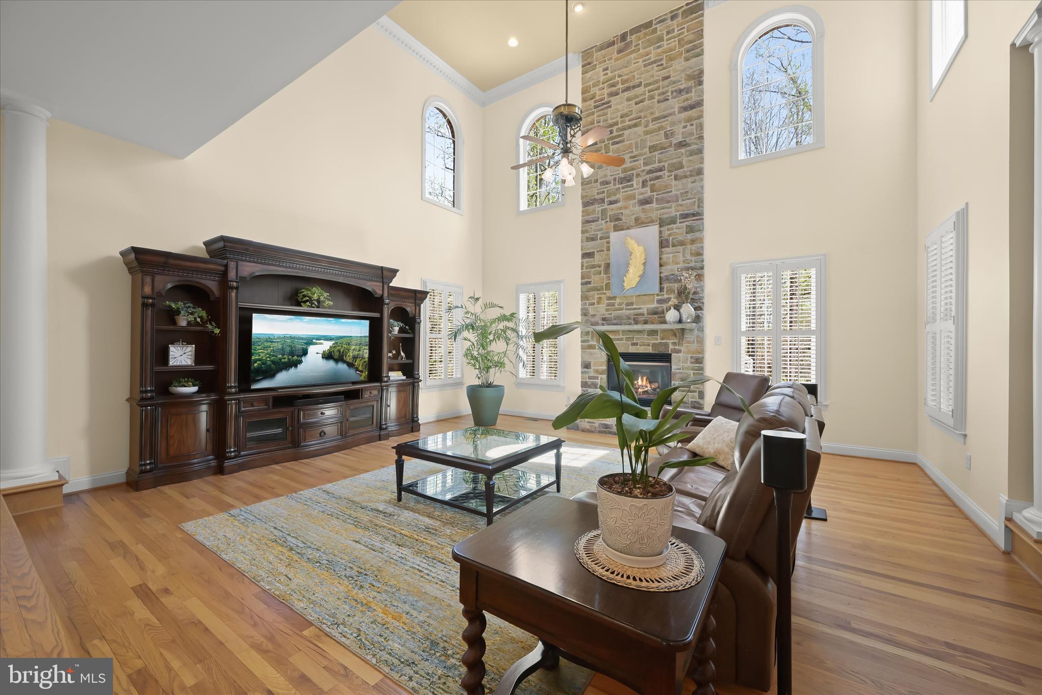 7016 Meandering Stream Way Fulton, MD 20759 - Photo 13 of 86 a living room with furniture and a fireplace