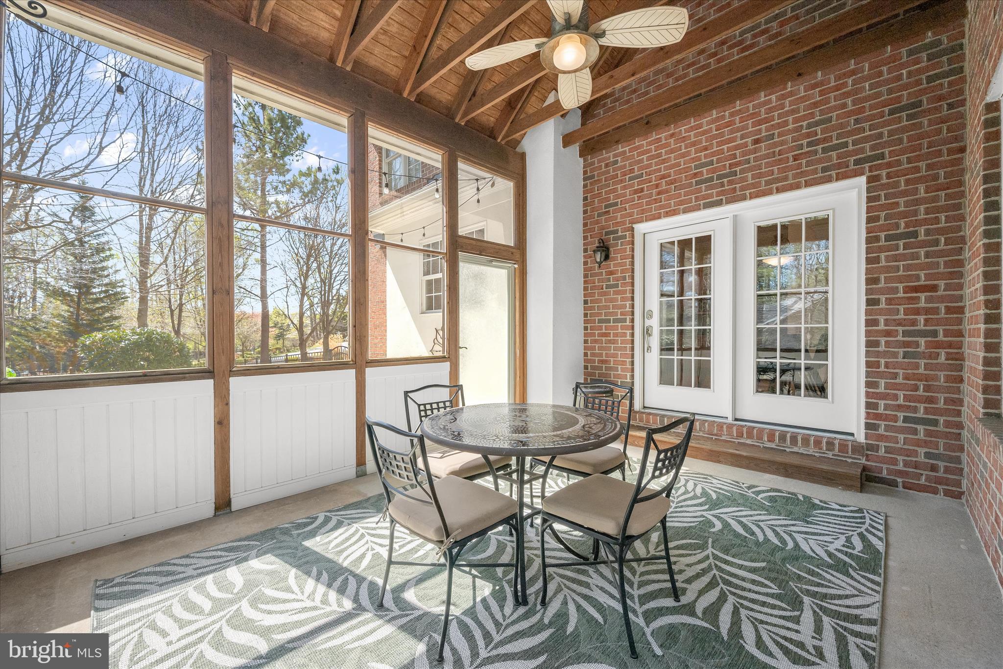 7016 Meandering Stream Way Fulton, MD 20759 - Photo 26 of 86 a dining room with furniture a chandelier and wooden floor