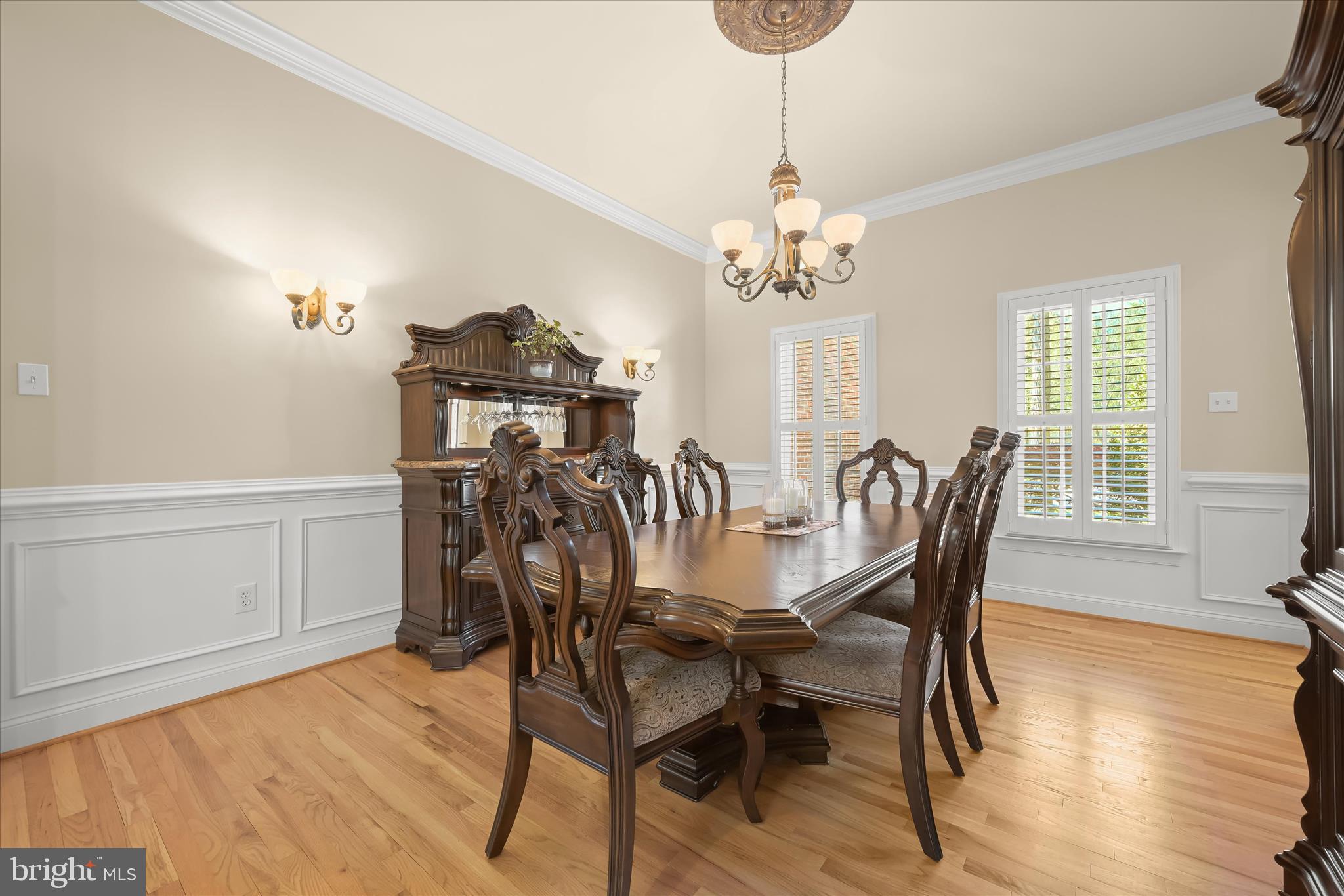 7016 Meandering Stream Way Fulton, MD 20759 - Photo 28 of 86 a view of a dining room with furniture window and wooden floor