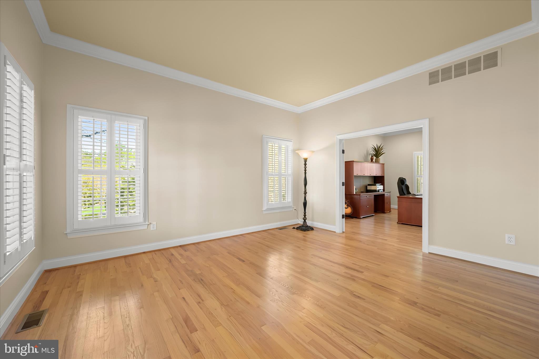 7016 Meandering Stream Way Fulton, MD 20759 - Photo 33 of 86 an empty room with wooden floor and a window