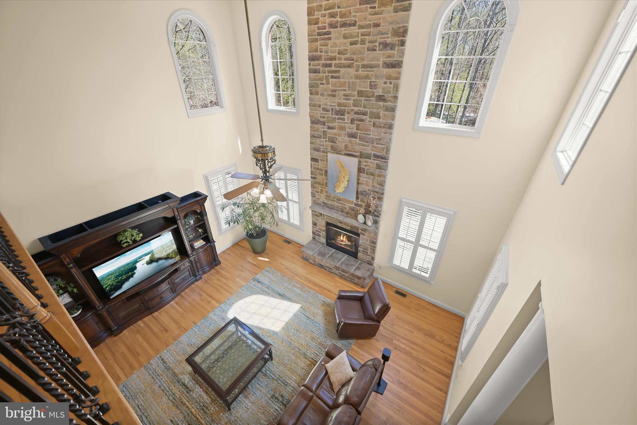 7016 Meandering Stream Way Fulton, MD 20759 - Photo 39 of 86 a living room with furniture and a flat screen tv