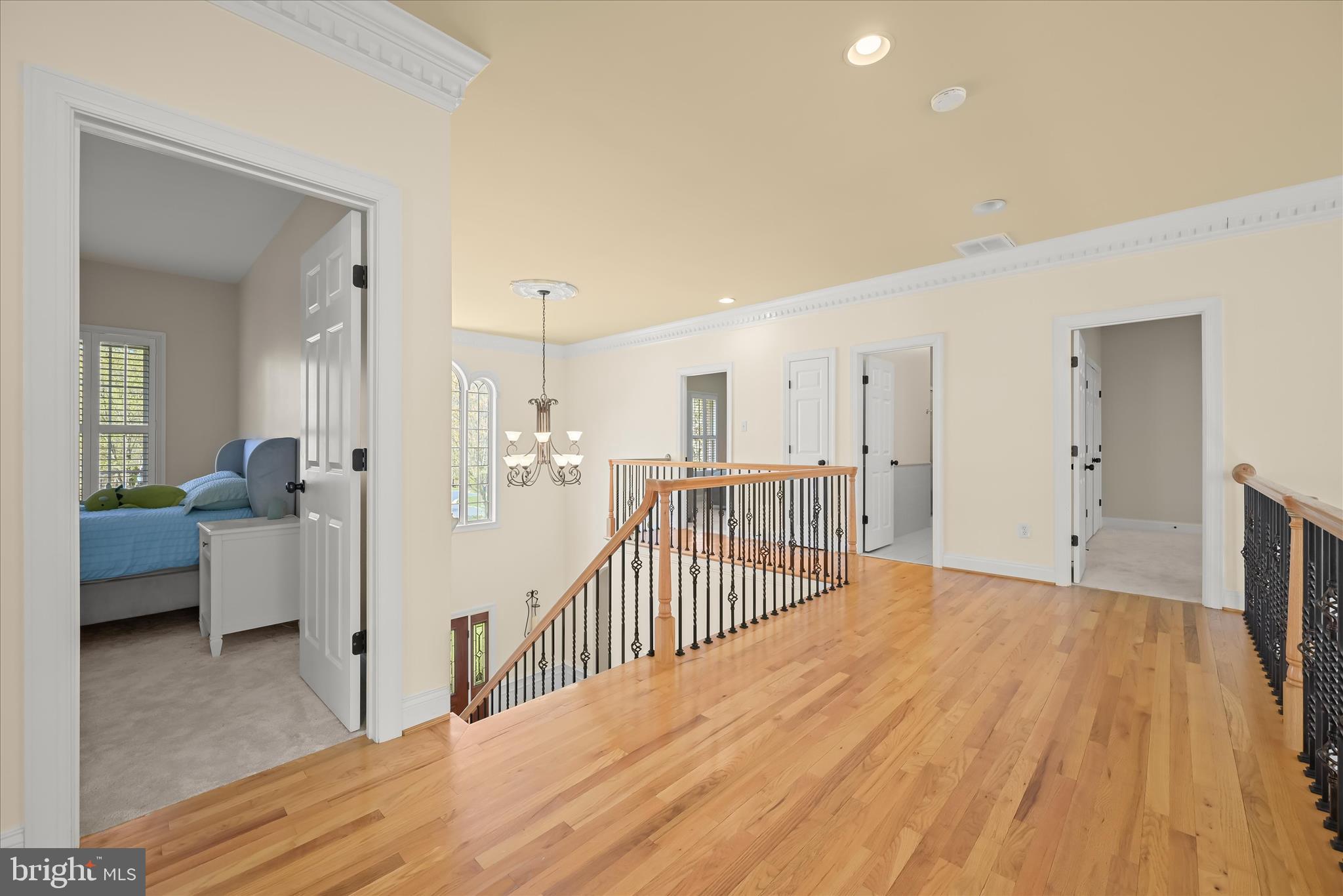 7016 Meandering Stream Way Fulton, MD 20759 - Photo 48 of 86 a view of a bedroom with furniture and windows