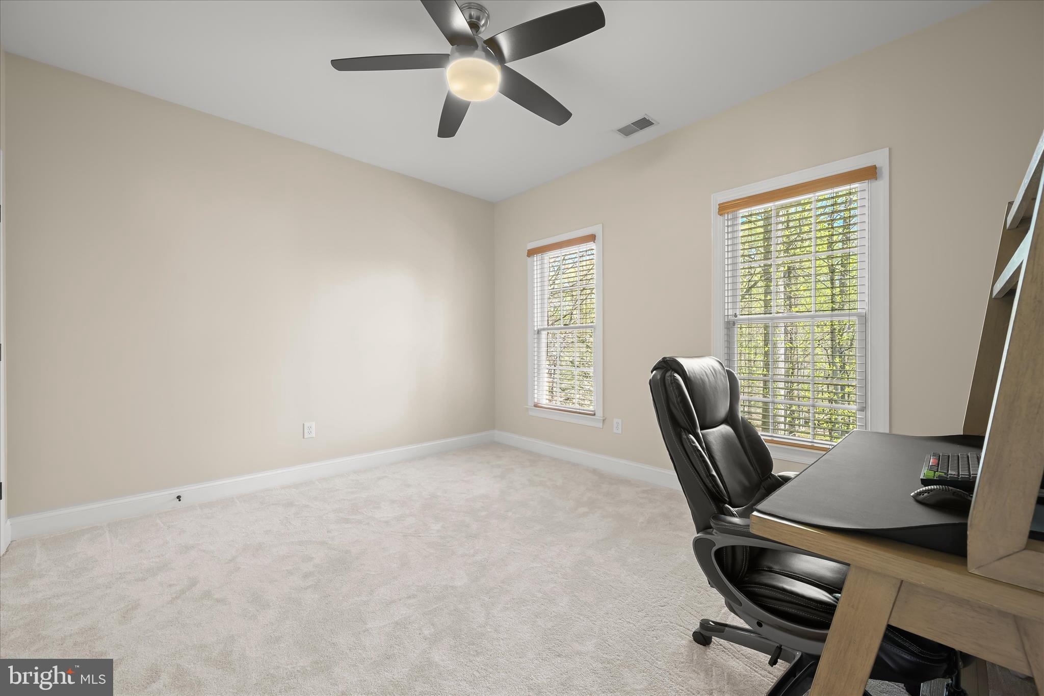 7016 Meandering Stream Way Fulton, MD 20759 - Photo 52 of 86 a view of a workspace with furniture and a window