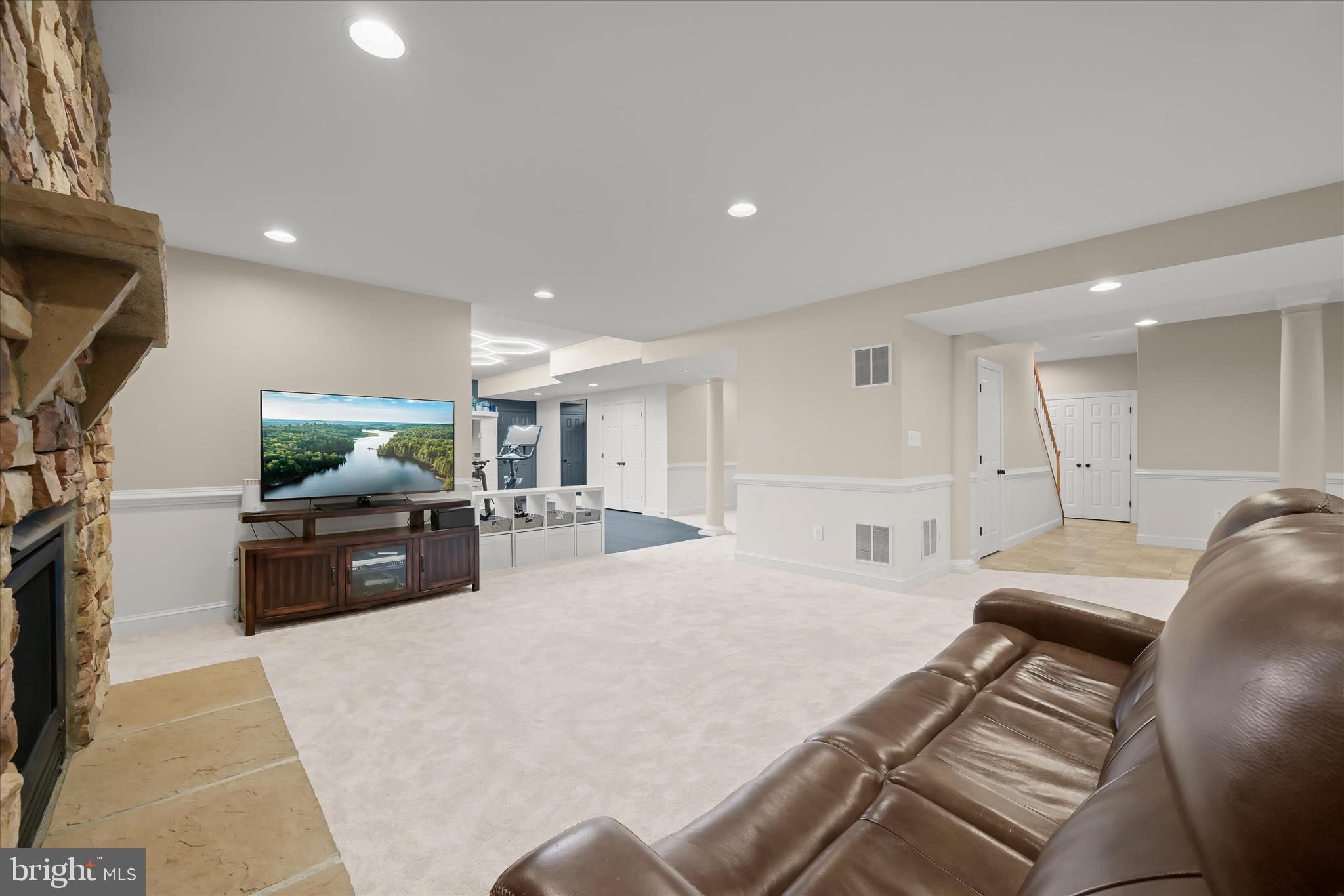 7016 Meandering Stream Way Fulton, MD 20759 - Photo 68 of 86 a living room with furniture and a flat screen tv