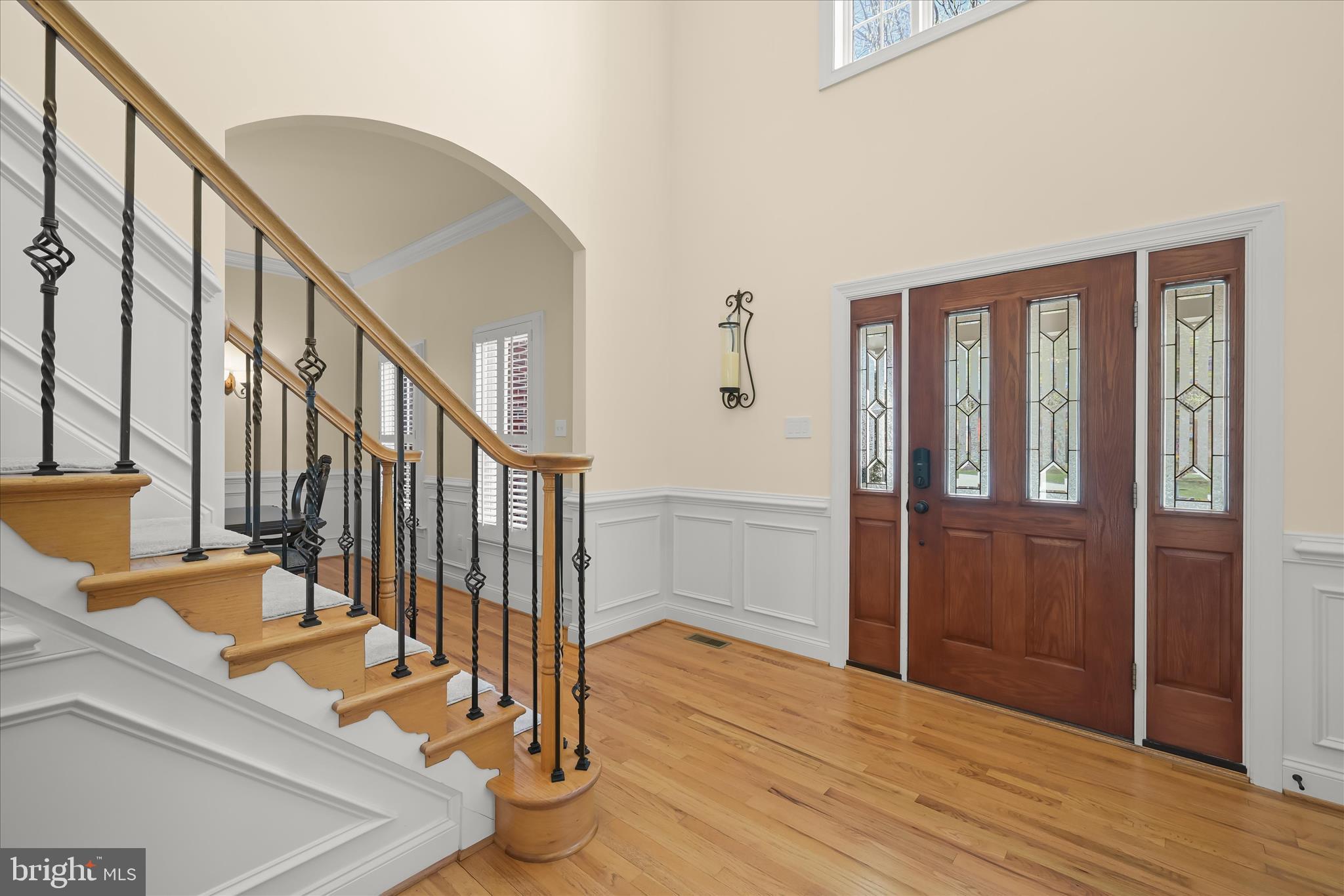 7016 Meandering Stream Way Fulton, MD 20759 - Photo 7 of 86 a view of an entryway with wooden floor and door