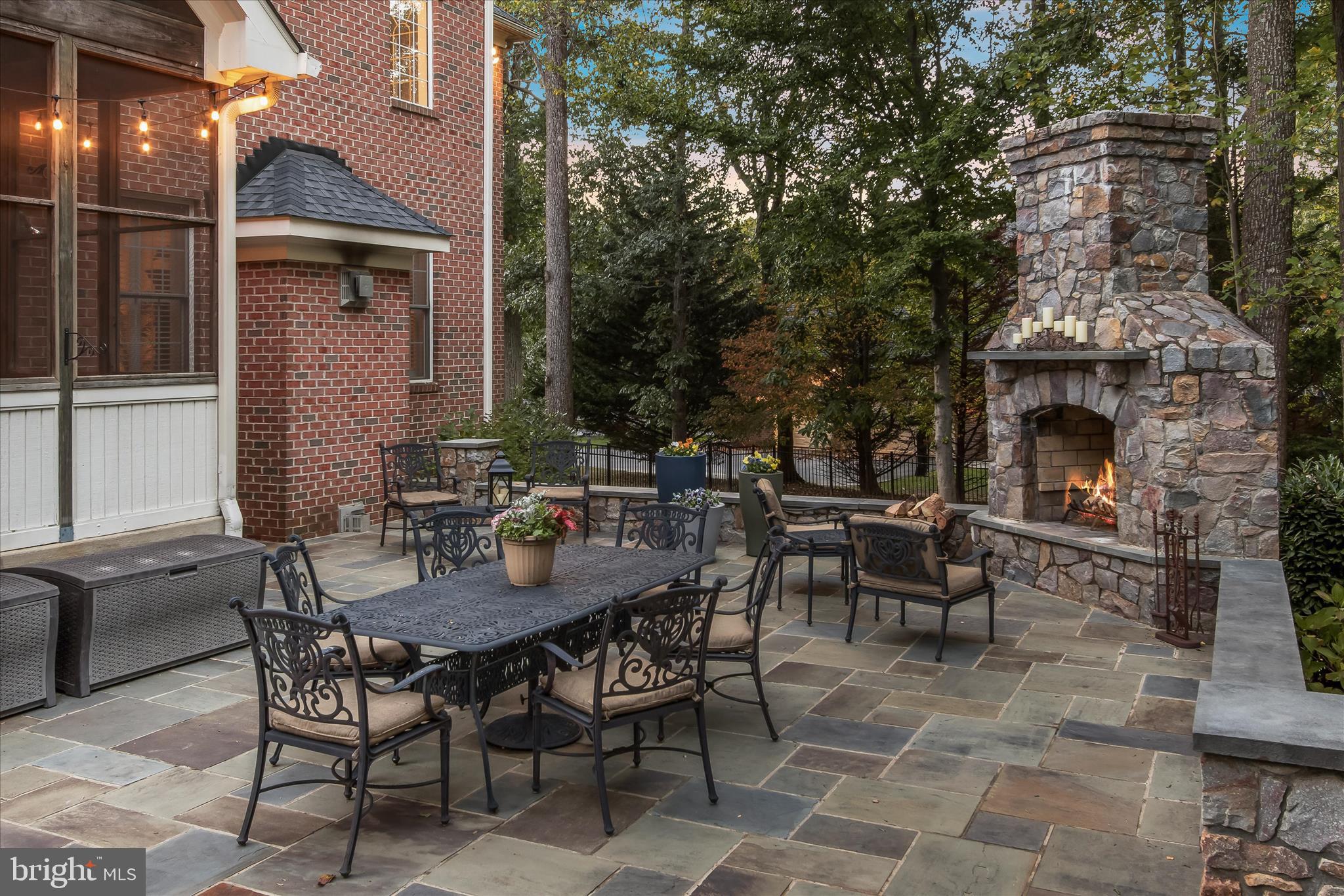 7016 Meandering Stream Way Fulton, MD 20759 - Photo 79 of 86 Private patio with fireplace