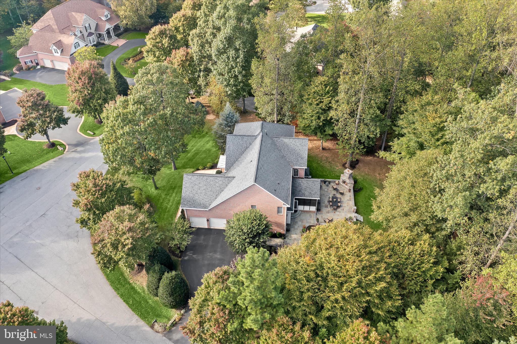 7016 Meandering Stream Way Fulton, MD 20759 - Photo 85 of 86 an aerial view of a house with yard and outdoor seating