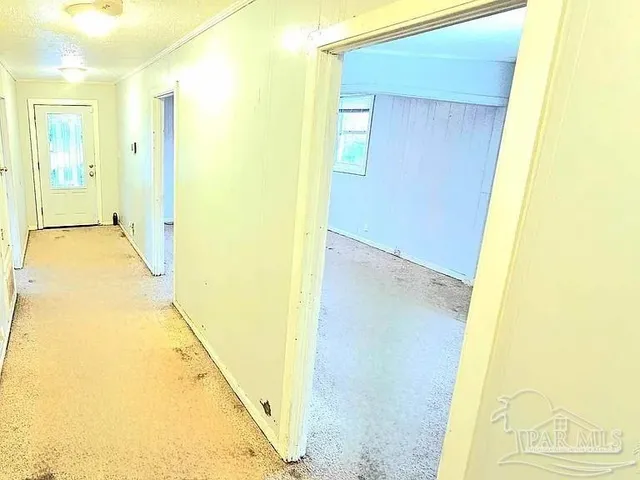 a view of a hallway with painted walls