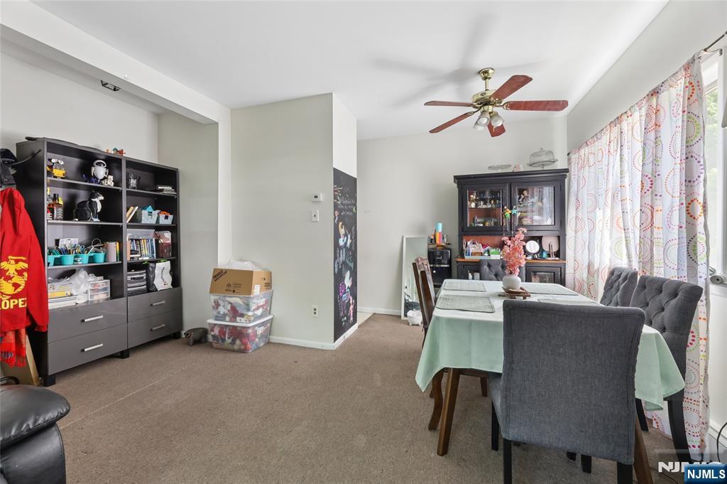 360 Rutherford Boulevard Clifton, NJ 07014 - Photo 26 of 42 a dining room with furniture and a window