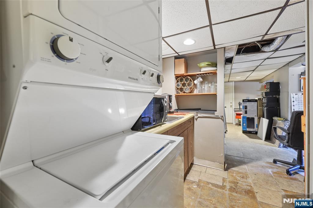 360 Rutherford Boulevard Clifton, NJ 07014 - Photo 29 of 42 a view of a hallway with the back of the kitchen