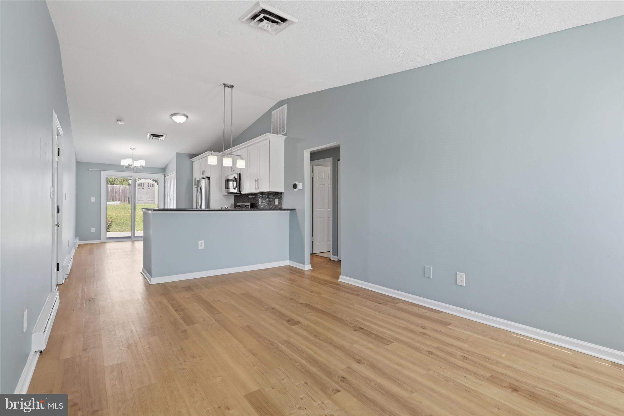 819 Chadwick Circle Frederick, MD 21701 - Photo 6 of 21 View from living room into kitchen & dining
