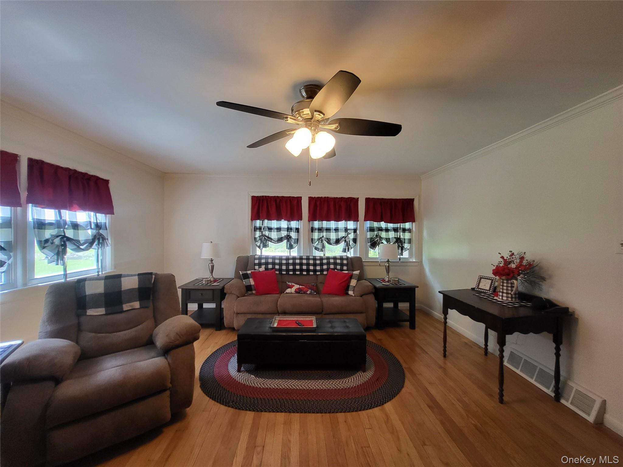 286 Dingle Daisy Road Monticello, NY 12701 - Photo 8 of 35 a living room with furniture and a flat screen tv