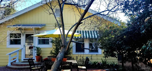 a view of a house with a trees