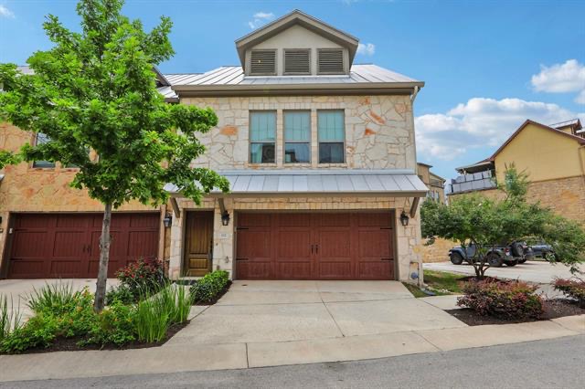 332 Adams Street Georgetown, TX 78628 - Photo 35 of 37 Natural stone masonry and a standing-seam metal roof create commanding curb appeal.