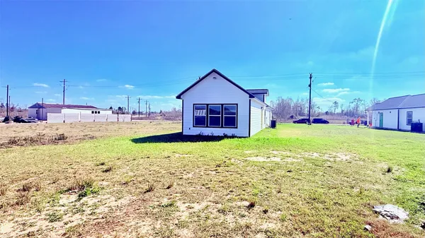 a view of kitchen and kitchen with wooden floor
