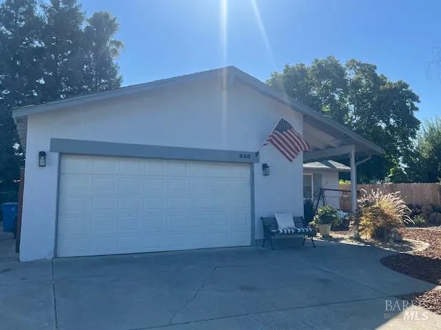 a view of a house with a street