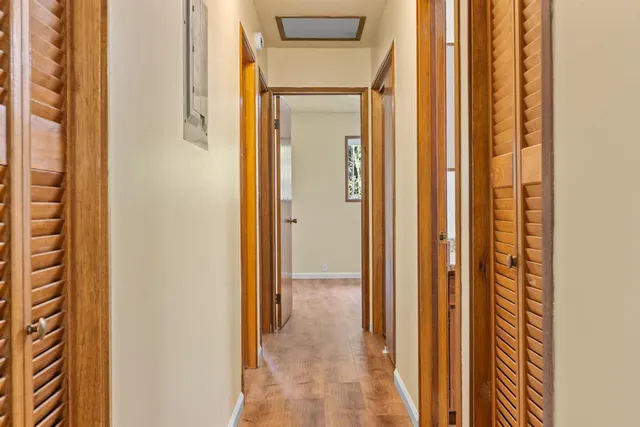 a view of a bathroom from a hallway