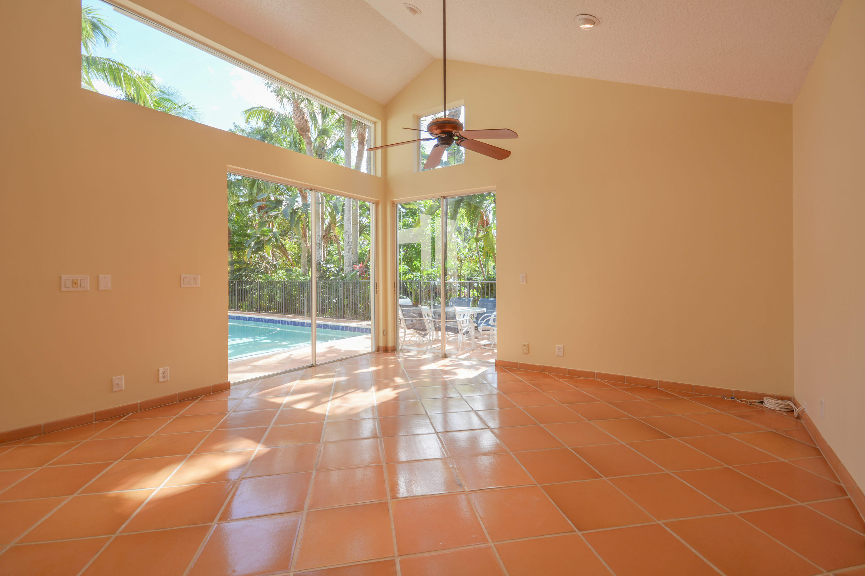 3046 Northwest 61st Street Boca Raton, FL 33496 - Photo 21 of 55 Family Room & Pool
